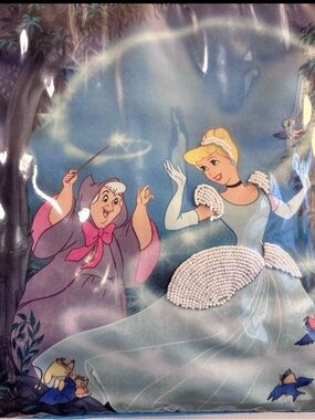 Disney Black Logo Patch on Teal Fabric